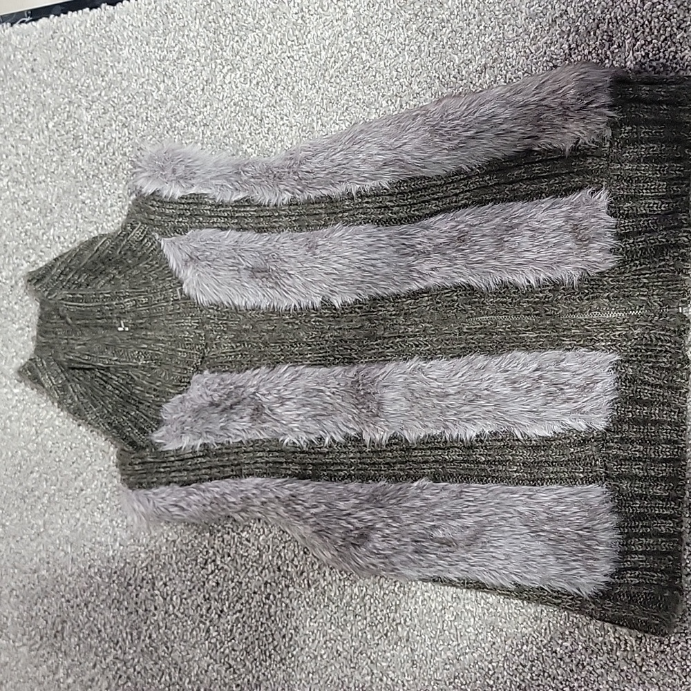 A faux fur and knit vest